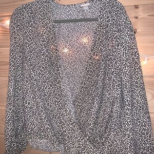 Black and white animal print blouse.